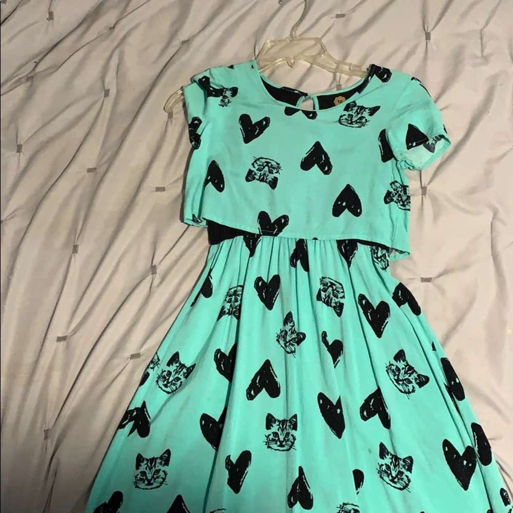mint green and black kitten design dress